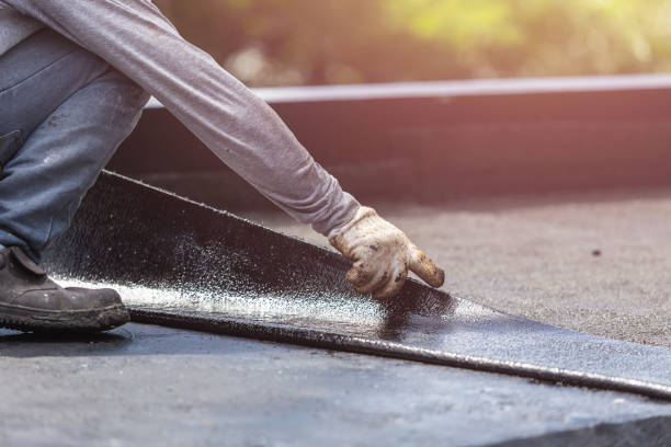 Professional Basement Waterproofing technician working in Aurora, IL
